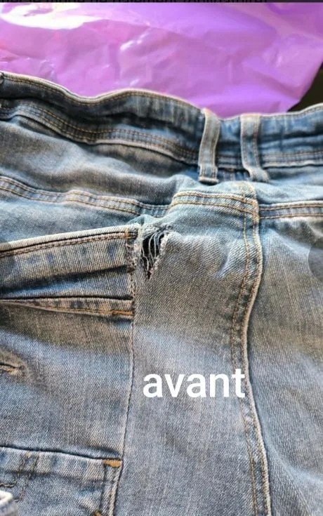 Jean avec un accroc déchiré avant réparation par LM Couture